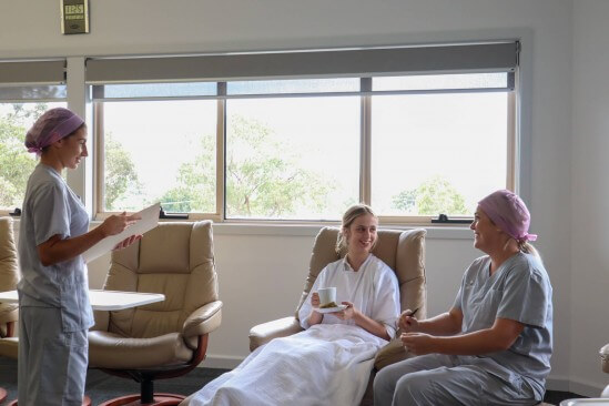nurses with a paitient 
